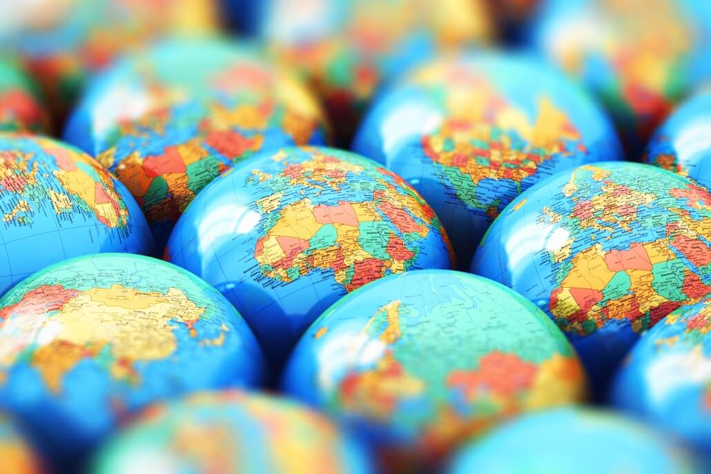 Globes representing worldwide business